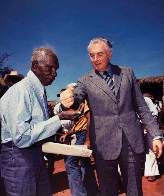 'Gough Whitlam pouring soil into the hands of traditional owner Vincent Lingiari', by Mervyn Bishop, Northern Territory, Australia, 1975 http://from.ph/344580